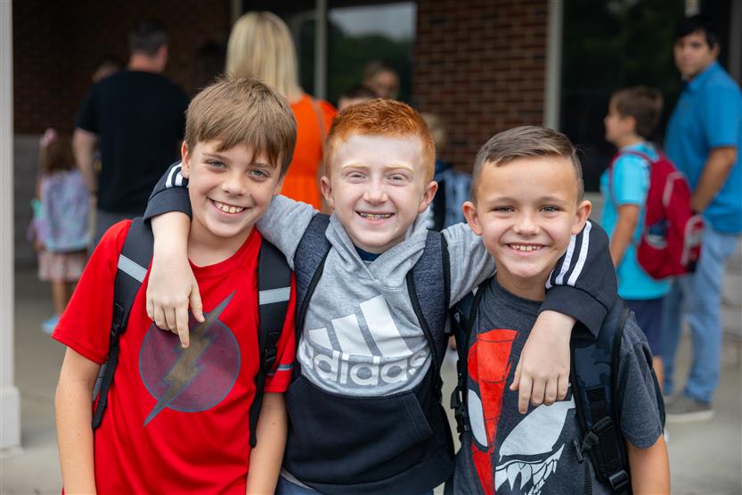 People smile on the first day of school